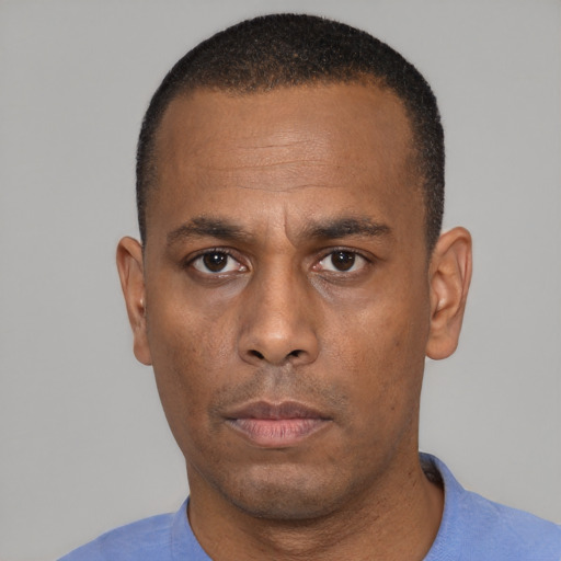 Neutral black adult male with short  black hair and brown eyes