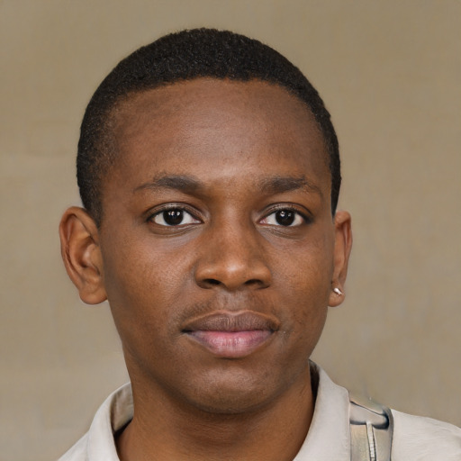 Neutral black young-adult male with short  brown hair and brown eyes