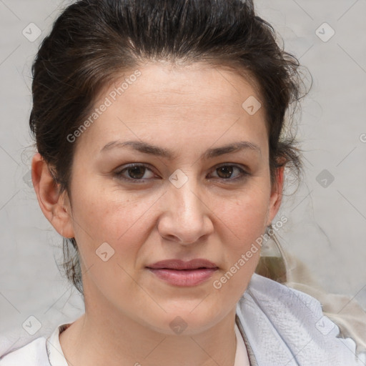 Joyful white adult female with medium  brown hair and brown eyes