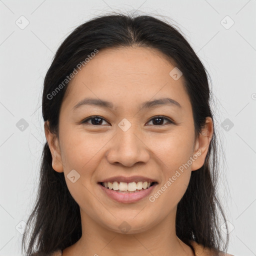 Joyful asian young-adult female with long  brown hair and brown eyes