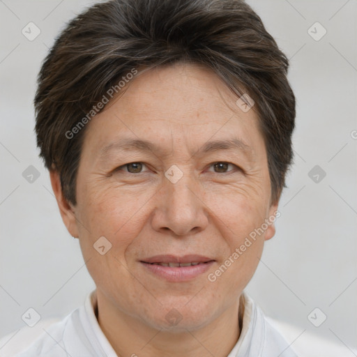 Joyful white adult female with short  brown hair and brown eyes