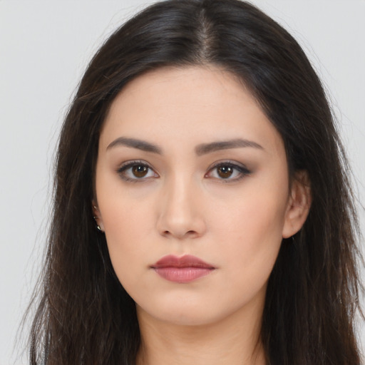 Neutral asian young-adult female with long  brown hair and brown eyes