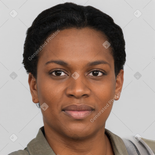 Joyful black young-adult female with short  black hair and brown eyes