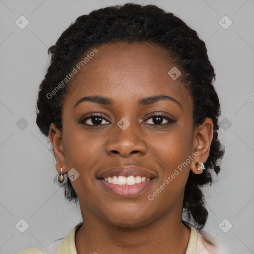 Joyful black young-adult female with medium  black hair and brown eyes