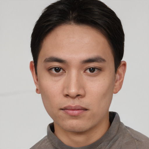 Neutral white young-adult male with short  black hair and brown eyes