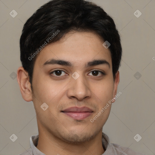 Joyful latino young-adult male with short  brown hair and brown eyes