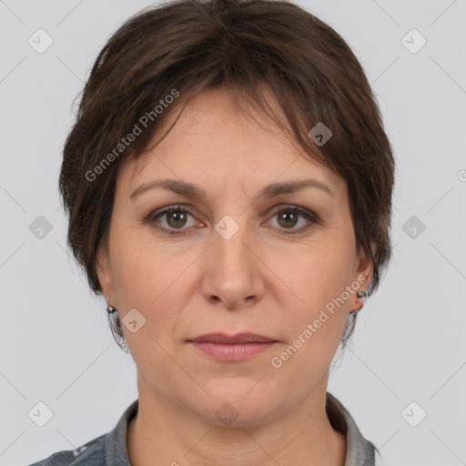 Joyful white adult female with short  brown hair and brown eyes