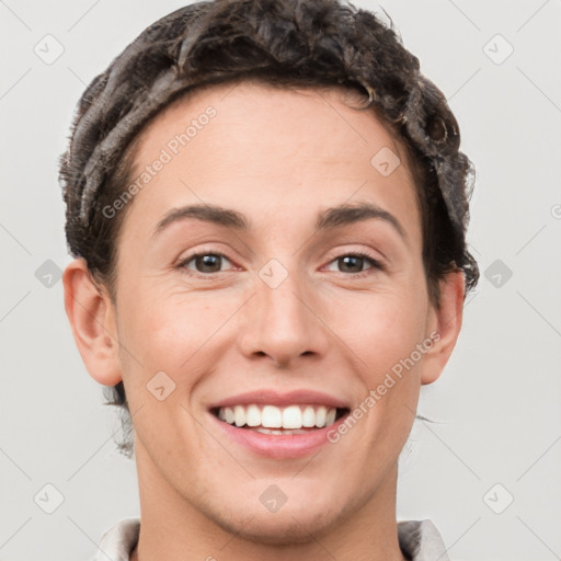 Joyful white young-adult female with short  brown hair and grey eyes