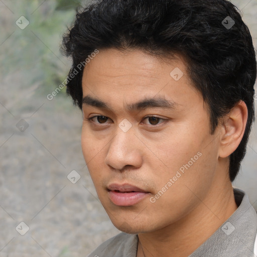 Neutral asian young-adult male with short  black hair and brown eyes