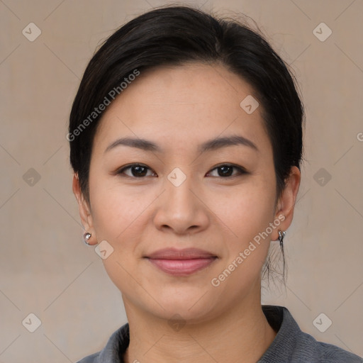 Joyful asian young-adult female with medium  black hair and brown eyes