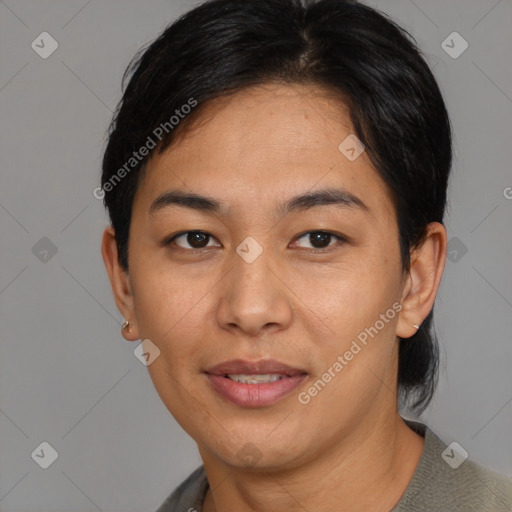 Joyful asian young-adult female with short  brown hair and brown eyes