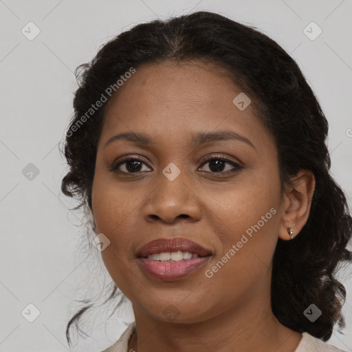 Joyful black young-adult female with medium  brown hair and brown eyes