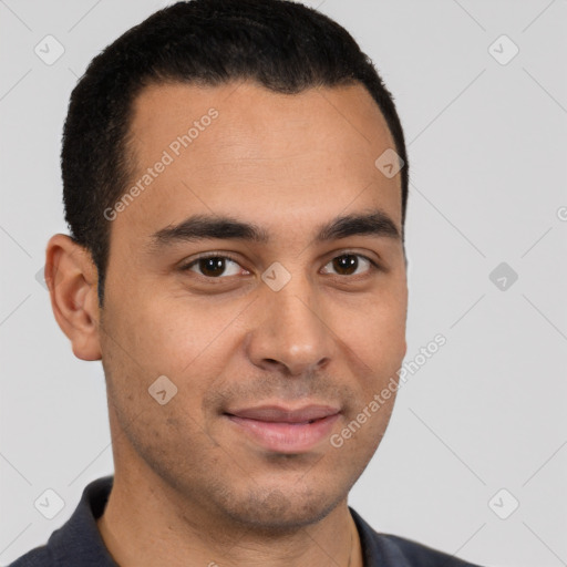 Joyful latino young-adult male with short  brown hair and brown eyes