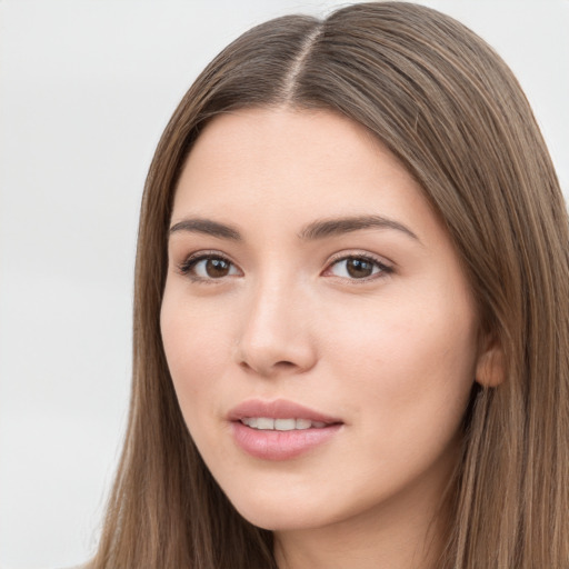 Neutral white young-adult female with long  brown hair and brown eyes