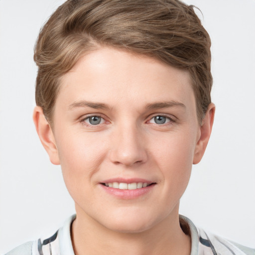 Joyful white young-adult female with short  brown hair and grey eyes