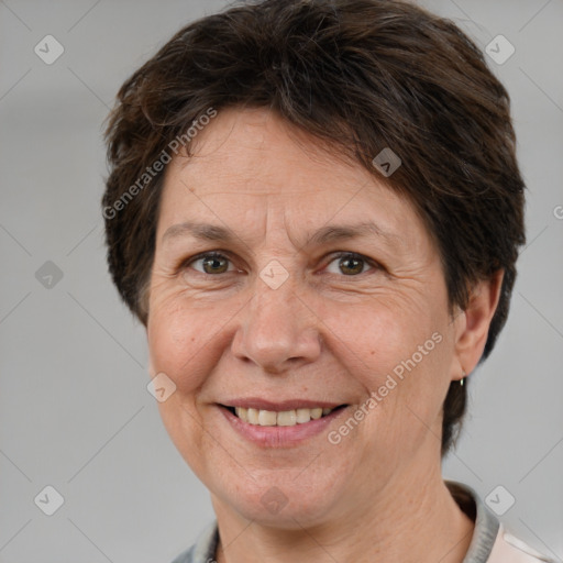 Joyful white adult female with short  brown hair and brown eyes