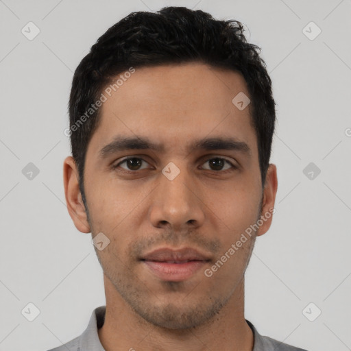 Neutral latino young-adult male with short  black hair and brown eyes