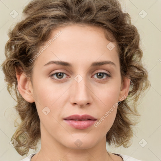 Joyful white young-adult female with medium  brown hair and green eyes