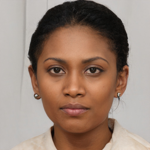 Neutral latino young-adult female with short  brown hair and brown eyes