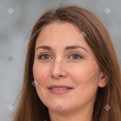 Joyful white adult female with long  brown hair and brown eyes