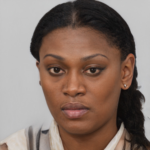 Neutral black young-adult female with medium  black hair and brown eyes