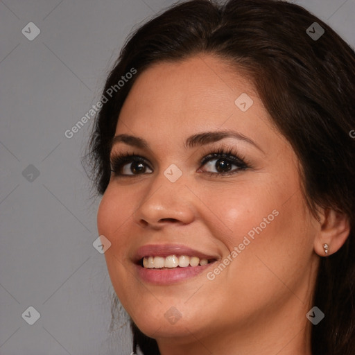 Joyful white young-adult female with long  brown hair and brown eyes