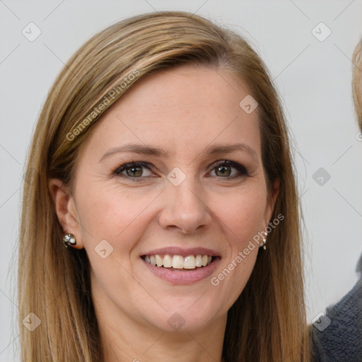 Joyful white young-adult female with medium  brown hair and blue eyes