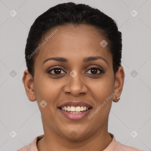 Joyful black young-adult female with short  brown hair and brown eyes