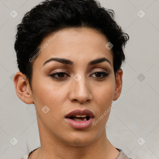 Joyful latino young-adult female with short  black hair and brown eyes