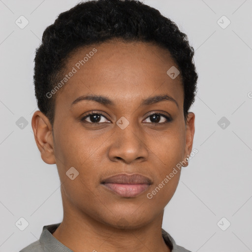 Joyful black young-adult female with short  black hair and brown eyes