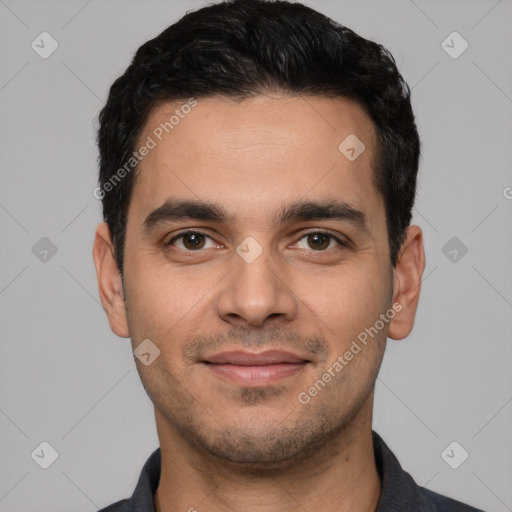 Joyful white young-adult male with short  black hair and brown eyes