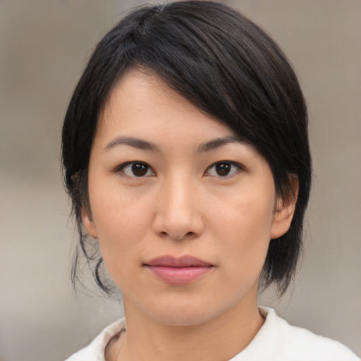 Neutral asian young-adult female with medium  brown hair and brown eyes