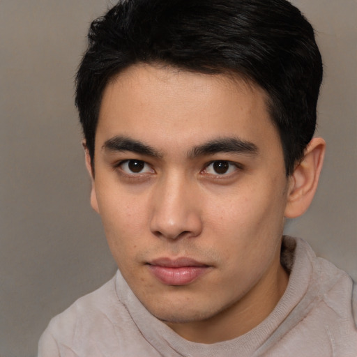 Neutral asian young-adult male with short  brown hair and brown eyes