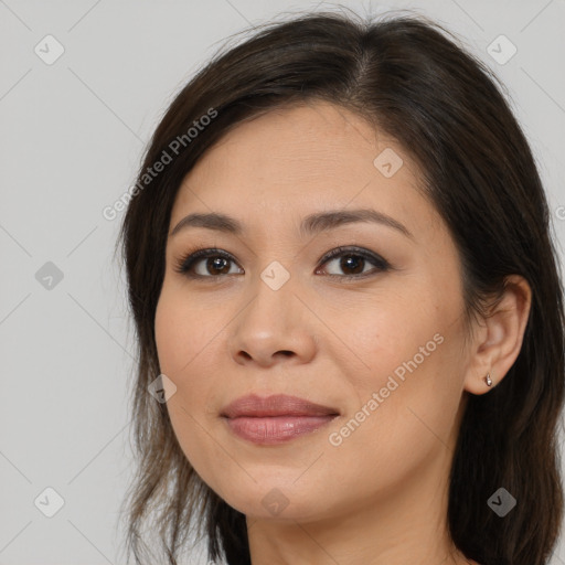 Joyful white young-adult female with long  brown hair and brown eyes