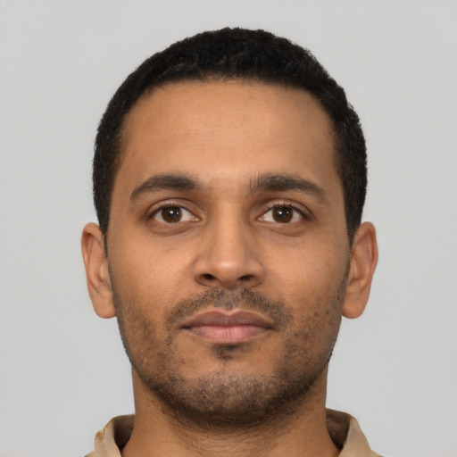 Neutral latino young-adult male with short  black hair and brown eyes