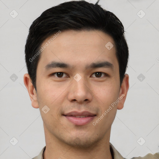 Joyful white young-adult male with short  black hair and brown eyes