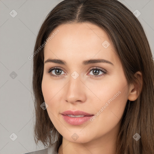 Neutral white young-adult female with long  brown hair and brown eyes