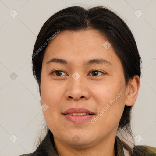 Joyful white adult female with medium  brown hair and brown eyes