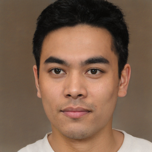 Neutral white young-adult male with short  black hair and brown eyes