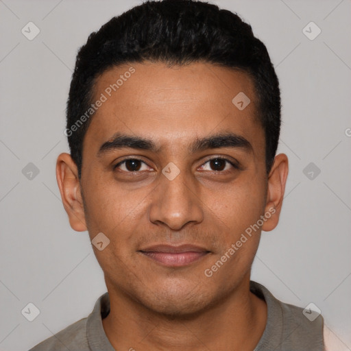 Joyful latino young-adult male with short  black hair and brown eyes