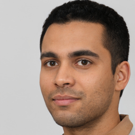 Neutral latino young-adult male with short  black hair and brown eyes