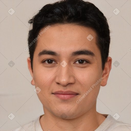 Joyful latino young-adult male with short  brown hair and brown eyes