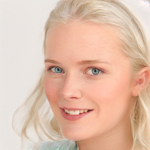 Joyful white young-adult female with medium  blond hair and blue eyes