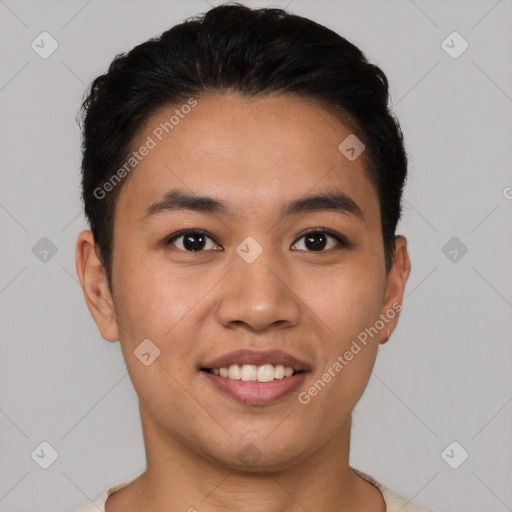 Joyful white young-adult male with short  black hair and brown eyes