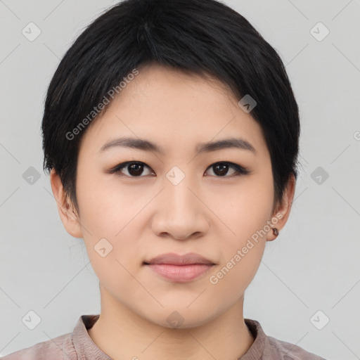 Joyful asian young-adult female with short  black hair and brown eyes