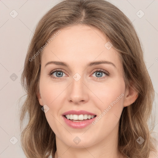 Joyful white young-adult female with medium  brown hair and green eyes