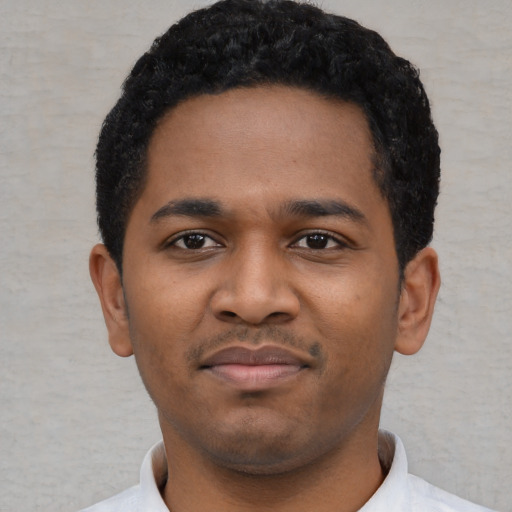 Neutral black young-adult male with short  black hair and brown eyes