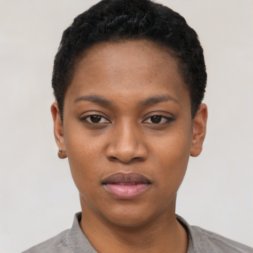 Neutral black young-adult female with short  black hair and brown eyes