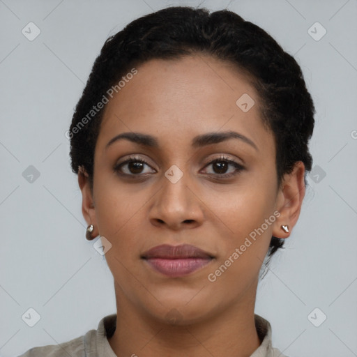 Joyful latino young-adult female with short  black hair and brown eyes