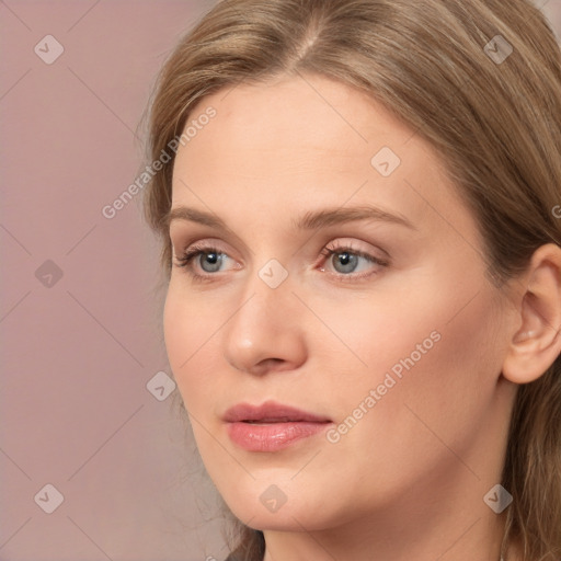 Neutral white young-adult female with long  brown hair and grey eyes